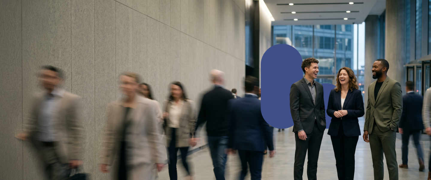 Colleagues meeting in a modern office lobby